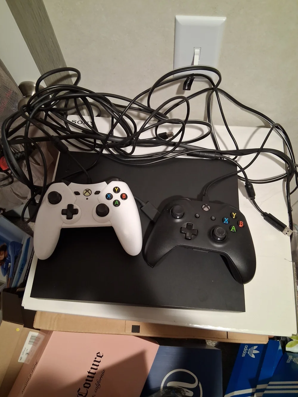 Sony Black PlayStation 4 Pro Console with PlayStation Logo & XBOX ONE BUNDLE
